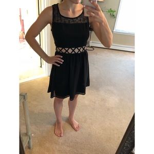 Black dress with cut outs and flower mesh top
